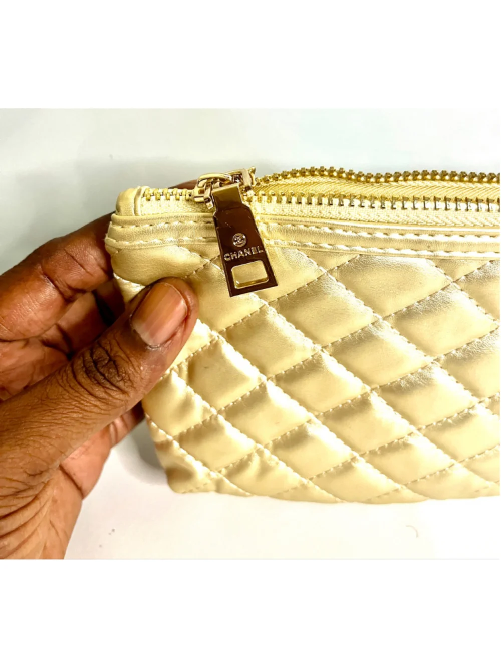 Chanel Makeup quilted gold pouch